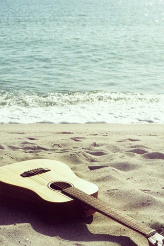 【海边的吉他手机壁纸】海边的吉他手机壁纸免